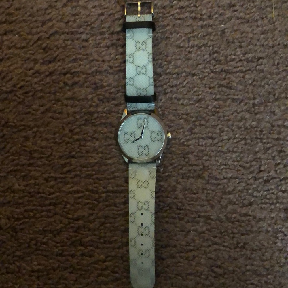 Gucci G-timeless floating GG steel watch